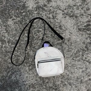 Small black and white marble purse with strap, brand new with tag from Claire’s